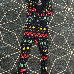 Festive Kids footie pajamas from primary - navy blue with holiday Patterns